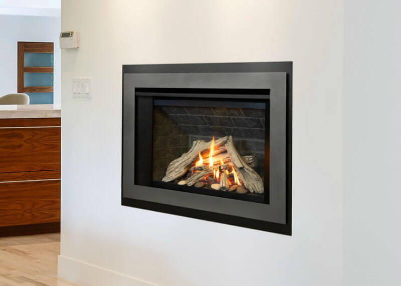 Valor H3 Gas Fireplace set in a wall with all white surround, no mantle