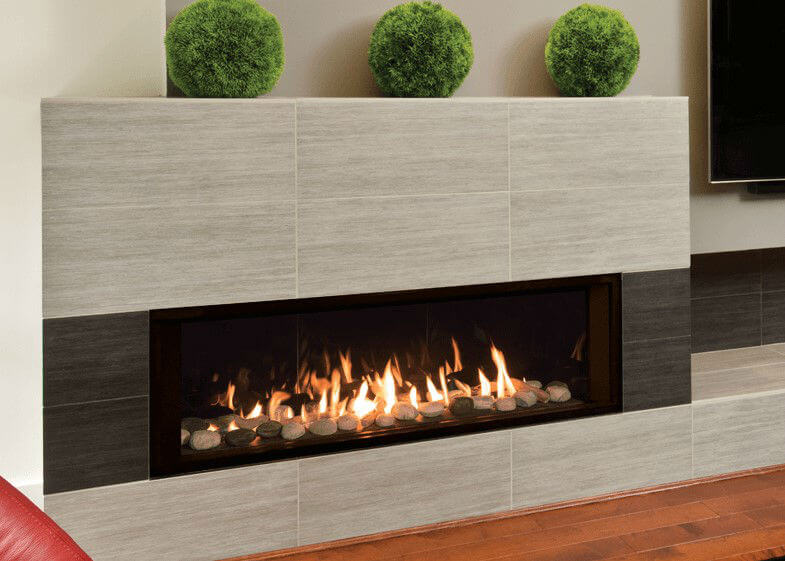 Valor L2 Linear Gas Fireplace - a wide linear view fireplace set in white and gray tile surround