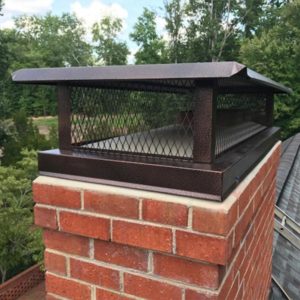 Brown Custom Made Outside Mount Chimney Cap With A FLat Lid