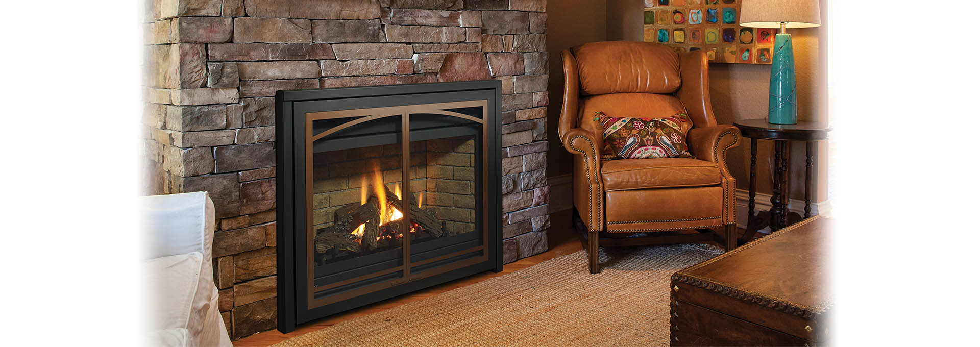 Regency P36E Gas Fireplace with layered dark stone surround