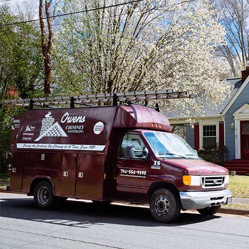 Owens Chimney Work Truck parked on residential street