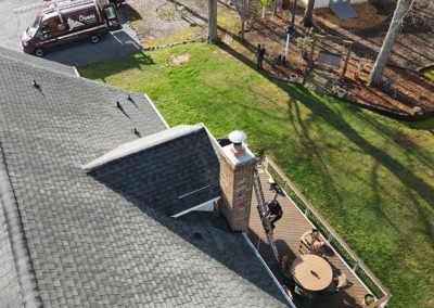 Aerial view of completed chimney cap installation