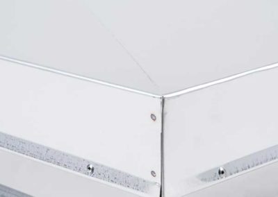 Close up of stainless steel chimney chase cover