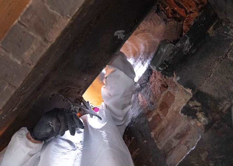 Inspector looking at the inside of a chimney 