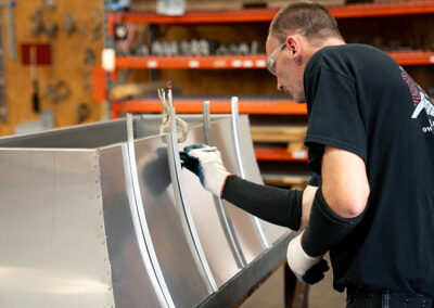 Technician creating a custom chimney cap
